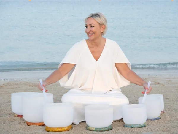 Lisa playing the crystal bowls